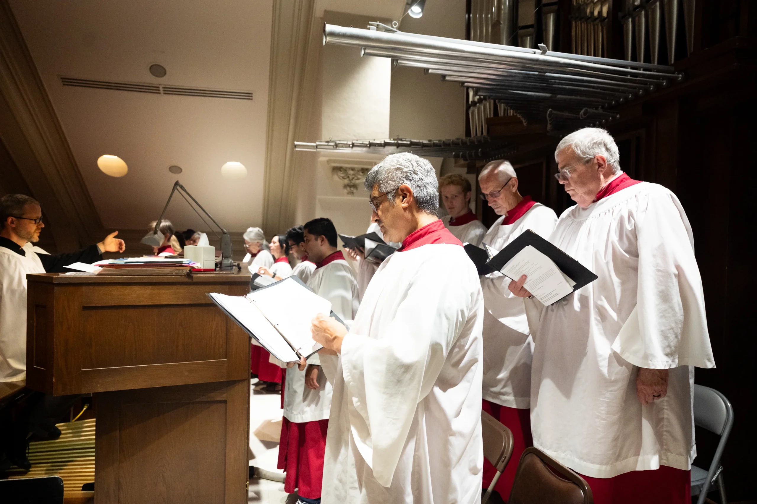 Adult choir singing.